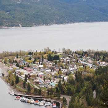 From the top of Wardner Trail, this is the view of Kootenay Lake and the sprawl of the encroaching village of Kaslo. This was taken in May of 2022, when the work begins on the Moyie ship (visible on t ...