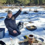 Carol Luttmer measuring groundwater levels