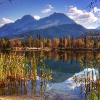 A beautiful lake used for swimming, boating, fishing and enjoying the view at the Mike Weigele heli skiing lodge in Blue River, BC.