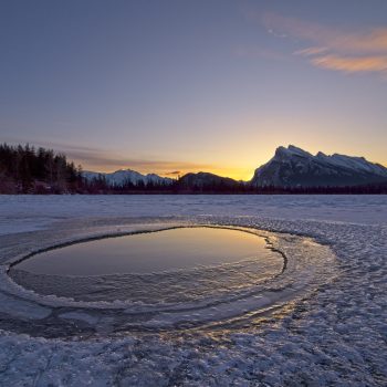 Despite the need for extra layers, hand warmers and a thermos of hot chocolate, winter is my favourite time to photograph sunrises and one of Banff National Park's most-recognized locations - Vermilio ...