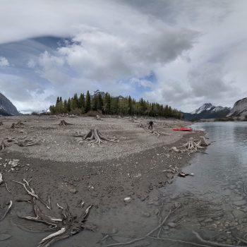 Upper Kananaskis Lake is a reservoir on the Kananaskis River. One of our favourite stops when kayaking this human-made mountain lake is Hawke Island. Wading out to just-over-the-knee depth and using t ...