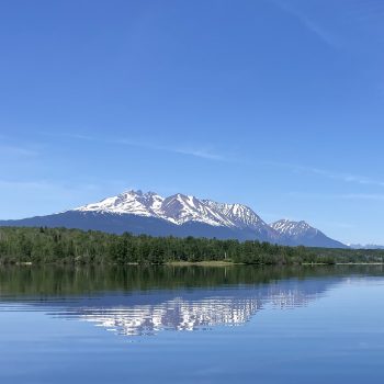 Sparkling clear day on a sparkling clear lake in the bulkley valley. Looking at Hudsons bay mountain.