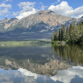 Beautiful reflection of the mountains off the tranquil lake.