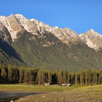 Frosty mountains and warm sunny days.