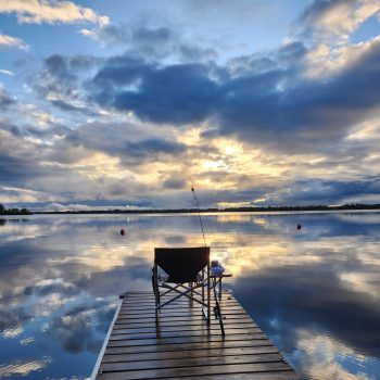 Peaceful evening fishing off the dock.