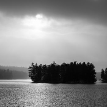 Early winter snow flurries fall over Norcan Lake.