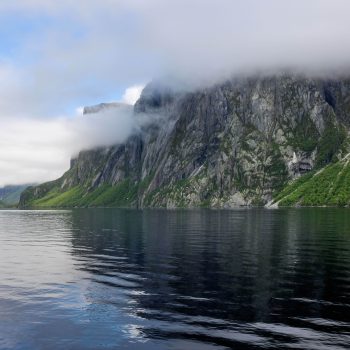 View of east end of lake from West Brook II tour boat. The morning fog just dissipated enough to reveal stunning cliffs in the fiord later in the afternoon.
Although the name is called a pond (landlo ...