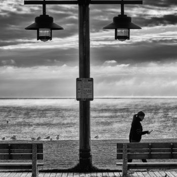 Walk with a view. There is a boardwalk in Gimli MB, where people enjoy the great outdoors while taking in Lake Wpg. and its beautiful sand beaches.