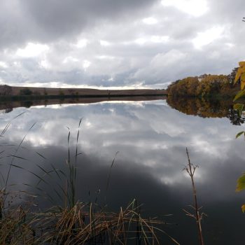 A picture of serenity bordered with the beautiful colors of Autumn.