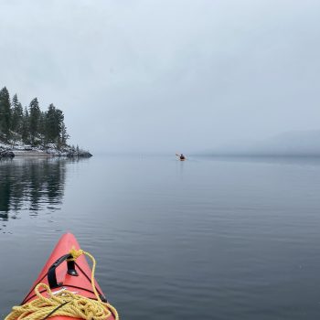 Celebrating our Anniversary of 35 years kayaking on a mirror calm Kootenay Lake